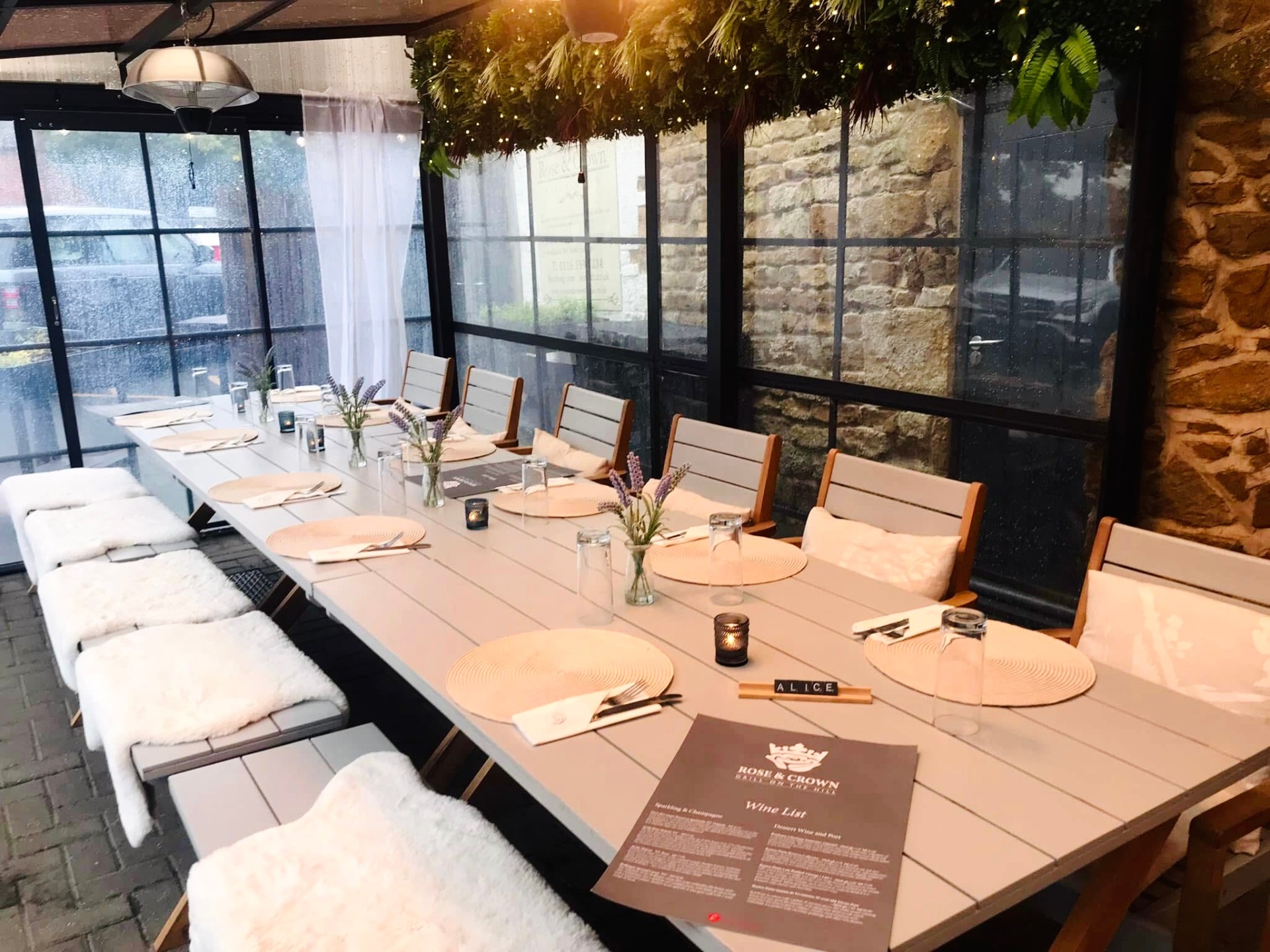 The Garden Room at the Rose and Crown — long candlelit table set for dinner